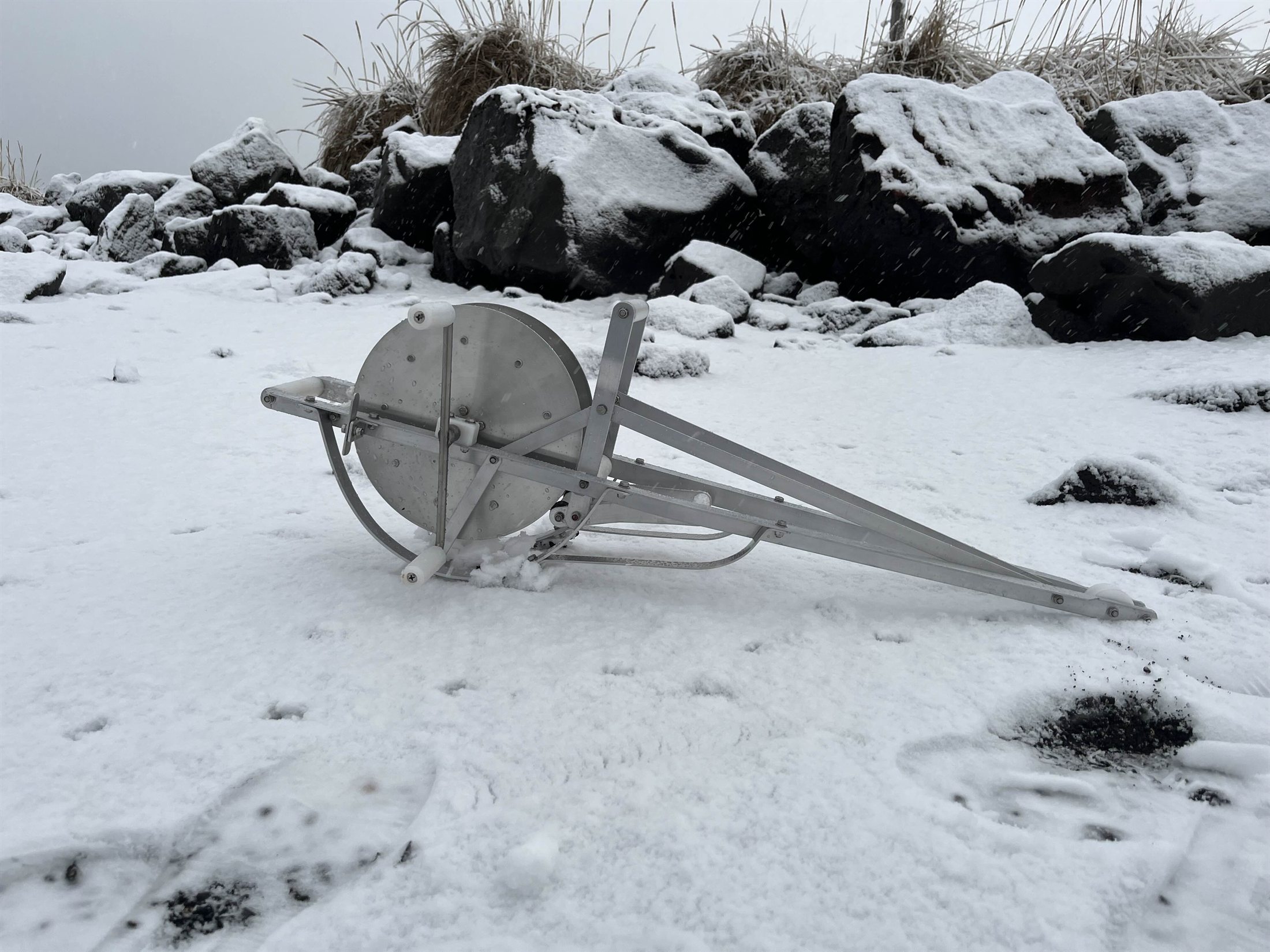 Large-drum Atlantic Reels manual sea-fishing system in snowy coastal conditions